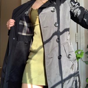 Black Trench coat with plaid lining.